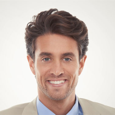 Smiling man in suit (client review)-Bridge Health