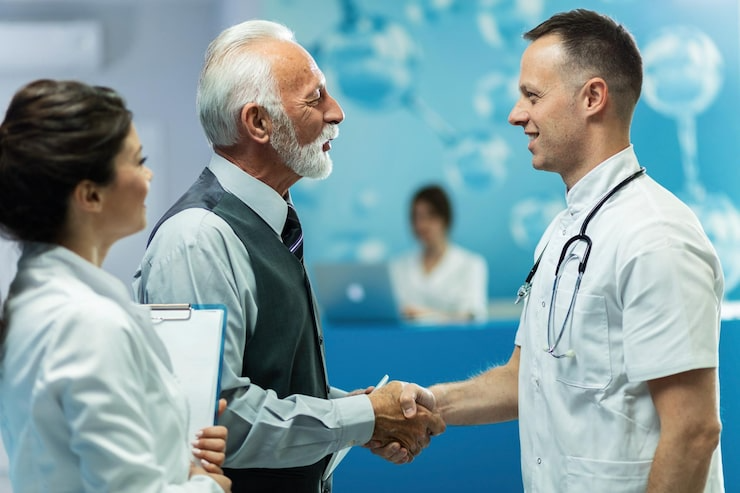 Doctor shakes man's hand-Bridge Health (Bridge Health)